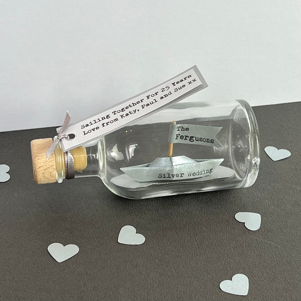 personalised silver anniversary paper boat in a bottle
