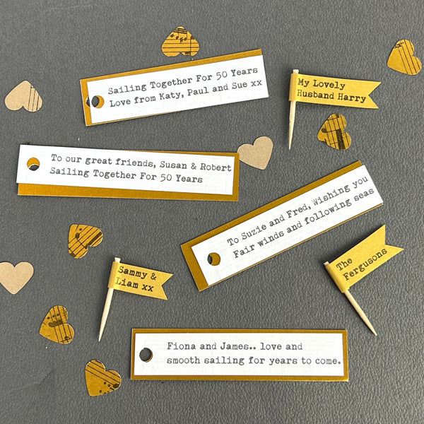 examples of personalised text for golden ship in a bottle by Made in Words