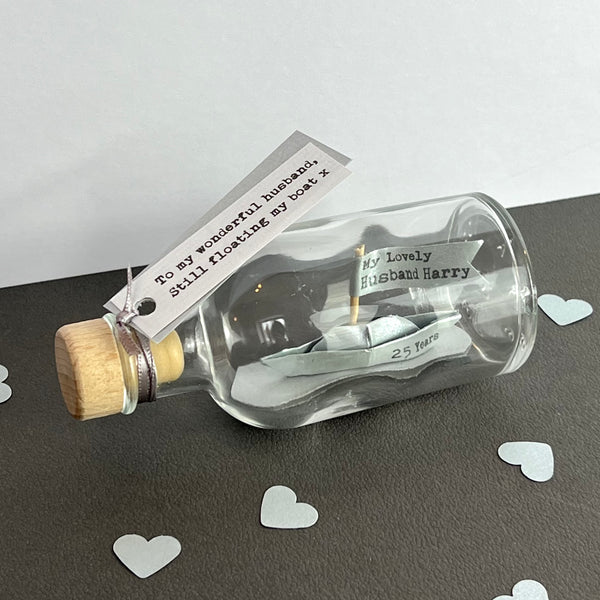 silver anniversary husband gift, personalised silver paper boat in a bottle
