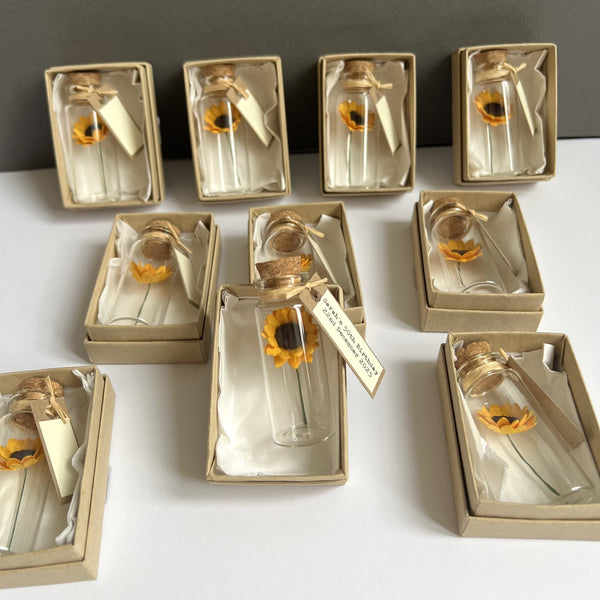 Sunflowers in a bottle wedding favour, party gift, or remembrance keepsake, available in sets of 10, 25 or 50