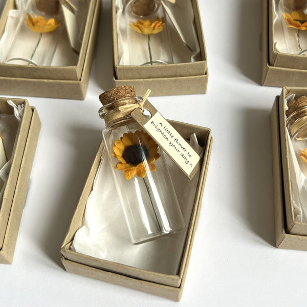 Sunflowers in a bottle wedding favour, party gift, or remembrance keepsake, available in sets of 10, 25 or 50